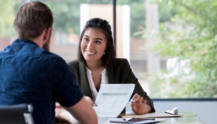 Broker with male and female client